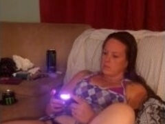 Thick girl playing video games with her legs wide open and her skirt up